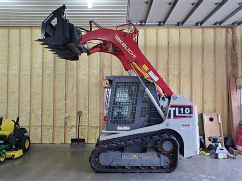 takeuchi skid steer bucket release|ignite attachment for takeuchi.